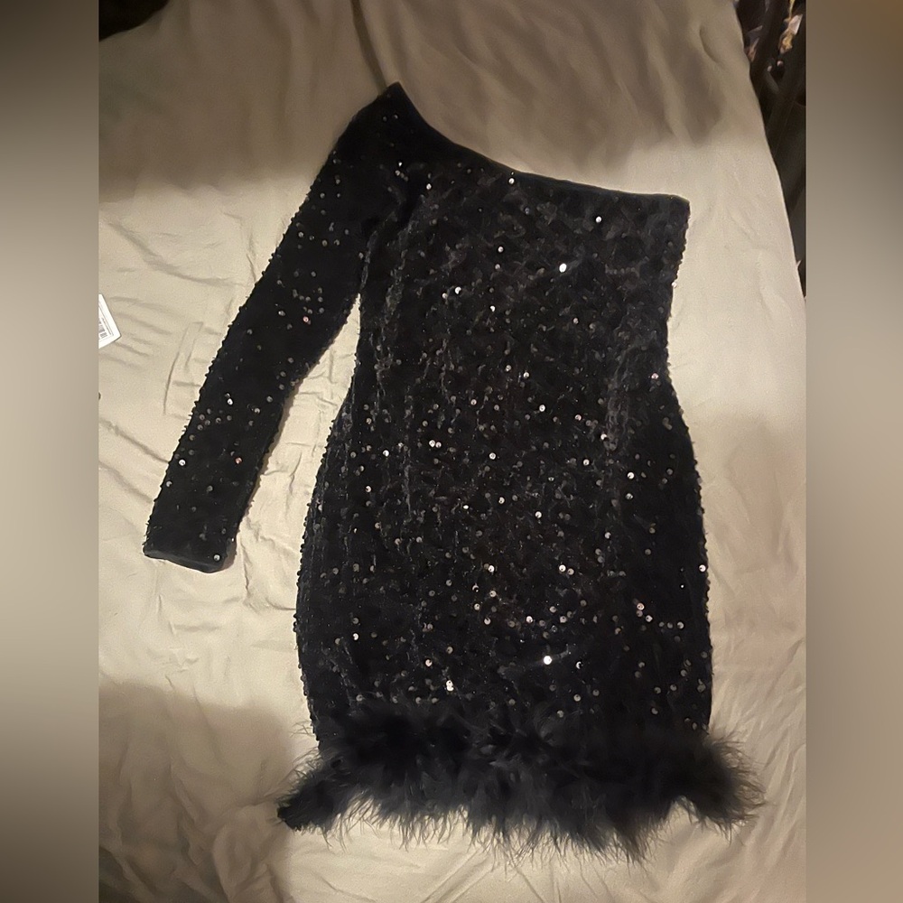 Never worn , was going to be my homecoming dress but didn’t come in time